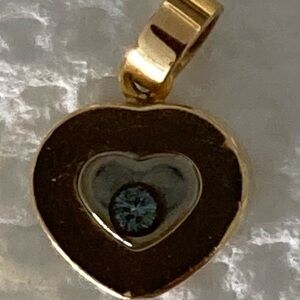 Chopard 18k Gold heart with diamond pendant